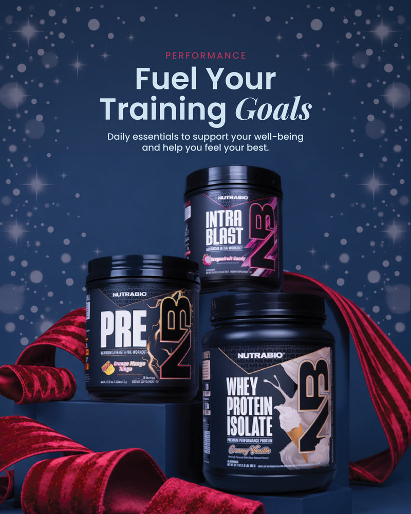 Promotional poster for Nutrabio supplements featuring three tubs of Pre, Intra Blast, and Whey Protein Isolate surrounded by a red velvet ribbon against a dark blue star-dusted background.