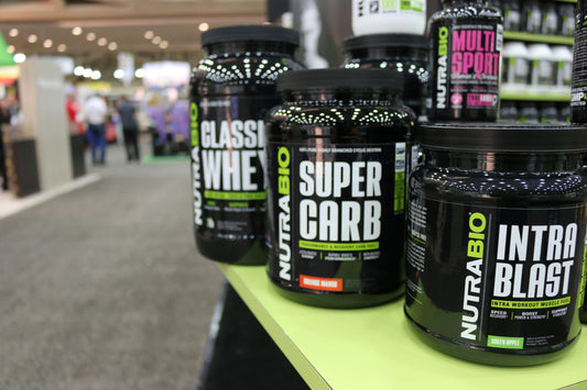 Bottles of classic whey, super carb, and intra blast supplements