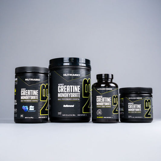 Four different container sizes of NutraBio Creatine Monohydrate are neatly lined up against a plain gray background.