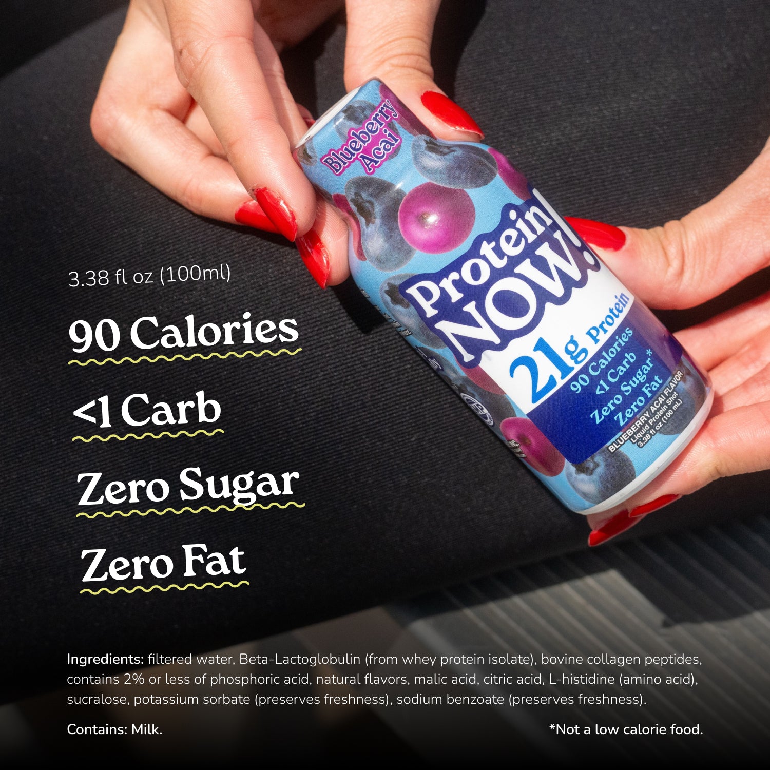 Protein Now Blueberry Acai protein shot held in hand, featuring 21g protein, 90 calories, less than 1g carb, zero sugar, and zero fat.