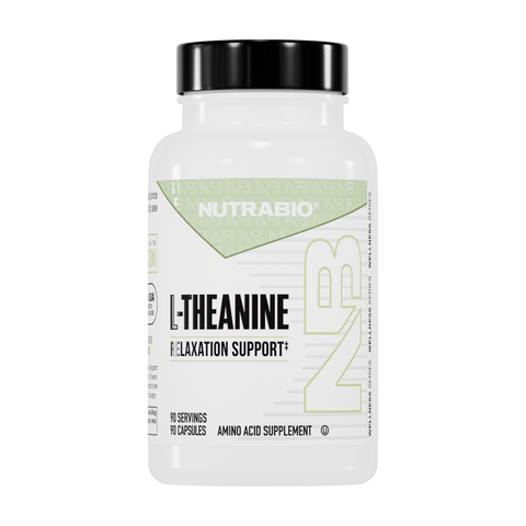 A white bottle of NutraBio L-Theanine (200mg) supplement with a black cap and green-accented label, featuring large NB initials. Contains 90 capsules, designed to support calm focus and mental performance.