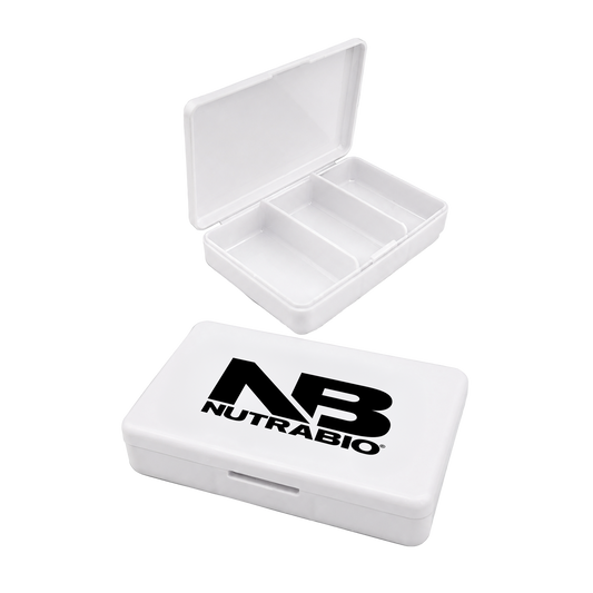 A white plastic pill organizer box shown in two views: one open with three compartments and one closed featuring a large black 'NB NUTRABIO' logo on the lid, set against a plain white background.