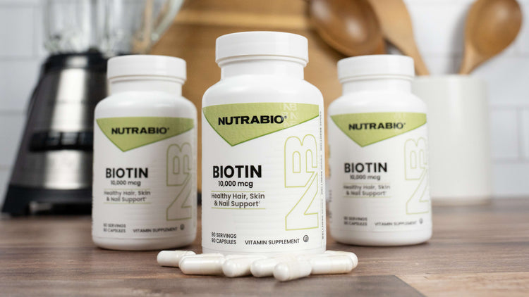NutraBio Biotin with pills on kitchen counter