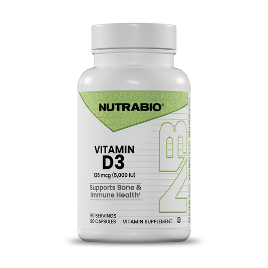 A white bottle of Nutrabio Vitamin D3 dietary supplement with a white cap, featuring a green and white label.