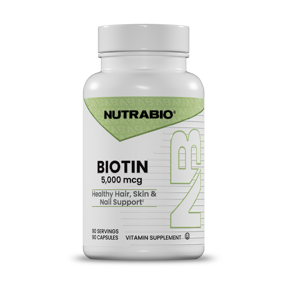 A white bottle of Nutrabio Biotin 5,000 mcg vitamin supplement with a white cap, shown on a clean white background.