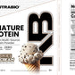 Product label for Signature Protein whey isolate powder, showing a nutrition facts panel, a description of the protein blend, and a photo of cookies and cream ice cream in a waffle cone.