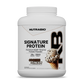 Large plastic tub of Signature Protein in cookies and cream flavor.