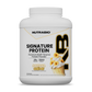 Large white plastic tub of Signature Protein banana creme flavored whey protein isolate, featuring a graphic of a banana-topped smoothie.