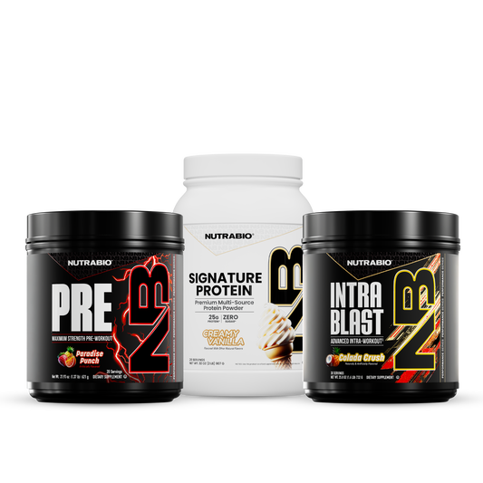 Two black tubs of Advanced Training Stack pre-workout supplement powder flanking a white tub of premium protein.