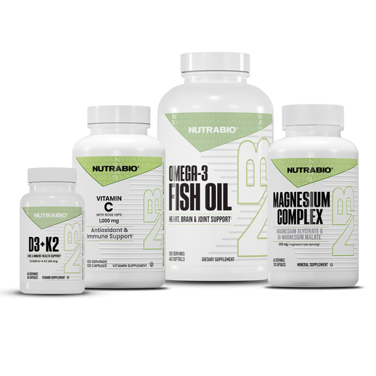 Daily Foundation Stack consisting of four white supplement bottles labeled D3+K2, vitamin C, Omega-3 Fish Oil, and magnesium complex.