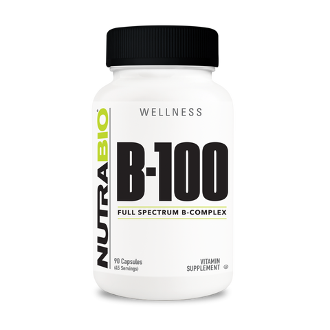 A white tub of NutraBio's B100 supplement on a white background.